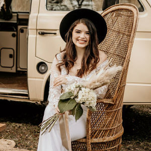 woman-sitting-witha-boquet-img